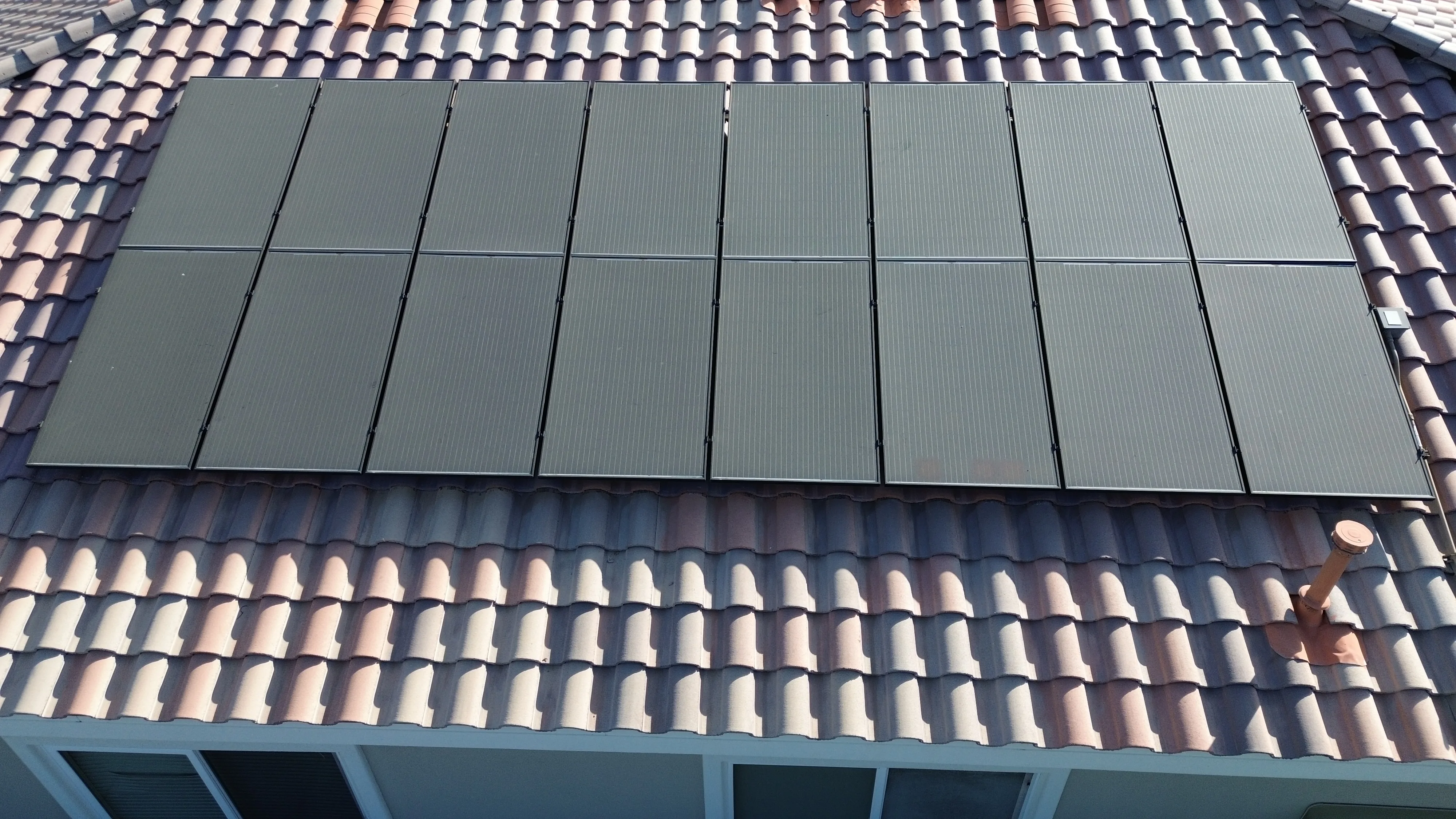 Tight roof detail with panel grid and tile texture — the kind of proof frame customers actually zoom in on.